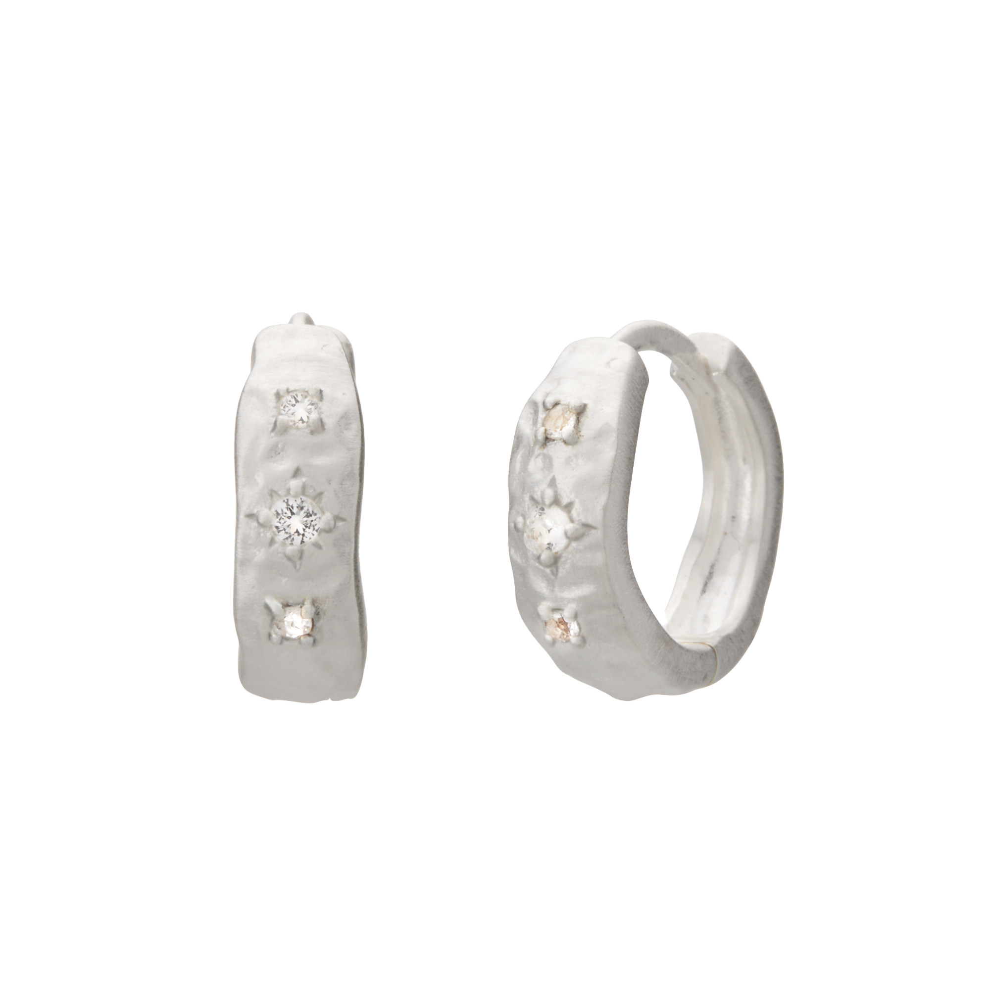 Silver hoop earrings with embedded stones on a white background